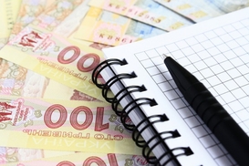 К середине торгов на межбанке доллар подешевел до 11,50 грн