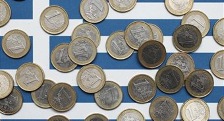 Курс евро/доллар держится выше отметки 1,36