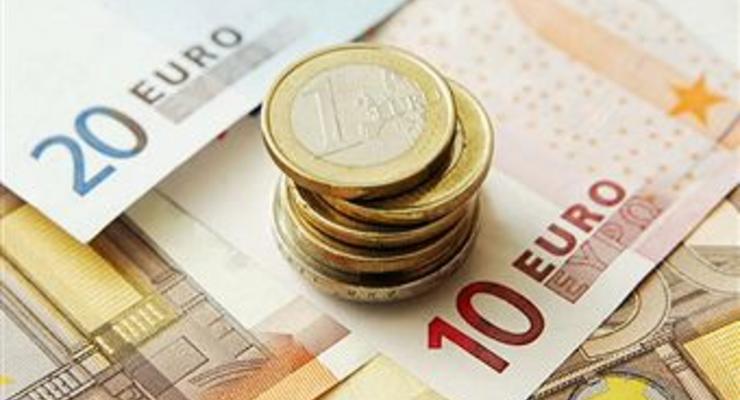 Евро снова упал до отметки 1,36 доллара