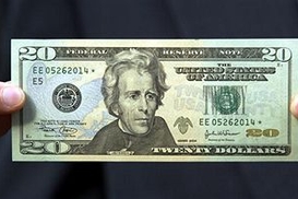 Курс евро/доллар держится выше 1,45