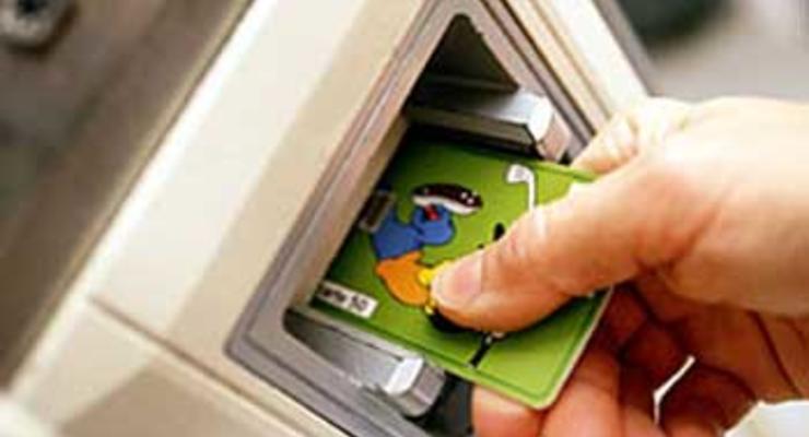«Сбербанк России» и Ощадбанк слились в банкоматах