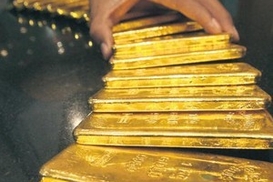 Золото на COMEX подешевело