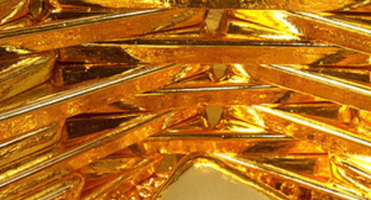 Цена золота перевалила за 1000 долл.