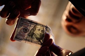 Гривна на межбанке снизилась до 26,60 грн/$