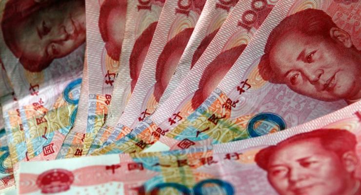 Народный банк Китая ослабил курс юаня