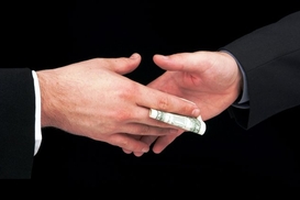 В МВФ подсчитали, во сколько обходятся взятки мировой экономике