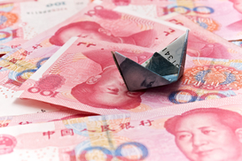 Центробанк Китая повысил справочный курс юаня на 0,3%